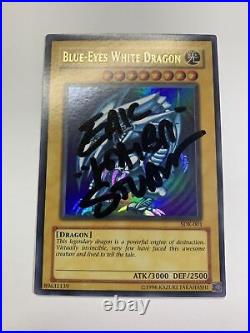 Blue-Eyes White Dragon SIGNED by Eric Stuart Yu-Gi-Oh SDK-001 Autograph Card NM