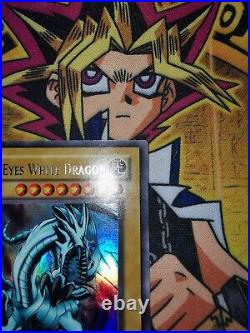 Blue-Eyes White Dragon lob-e001 1st Edition (GOOD-USED) Ultra Rare Yu-Gi-Oh