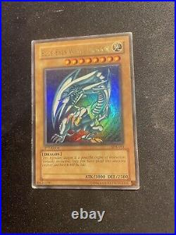 VERY RARE Blue-Eyes White Dragon SDK-00 1st Edition So So Condition Played