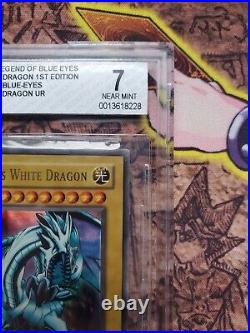 Yu-Gi-Oh! 2002 (Legend of) 1st Edition Blue Eyes White Dragon LOB-E001 BGS 7 PSA