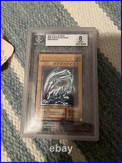 Yu-Gi-Oh! BGS 8 SM-51 Blue-Eyes White Dragon Ultimate Rare Relief Spell of Mask