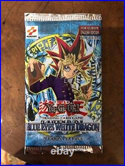 Yu-Gi-Oh Blue-Eyes White Dragon LOB-001 1st Edition & 1st edition booster pack