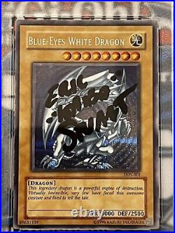 Yugioh Blue-Eyes White Dragon DDS-001 PSA 6 signed by voice of Kaiba Eric Stuart