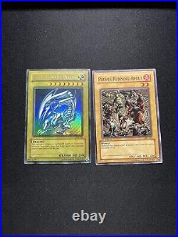 Yugioh Blue-Eyes White Dragon SDK-001 MP-HP Faded and Holo Bleed