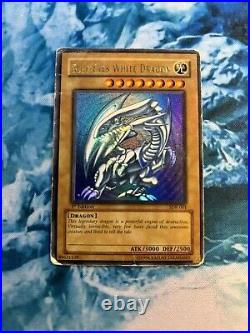 Yugioh Blue-Eyes White Dragon SDK-001 Ultra Rare 1st Edition DMG GLOSSY